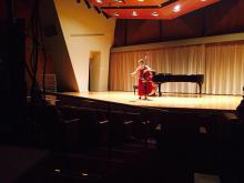 Mikyung Sung warming up before recital